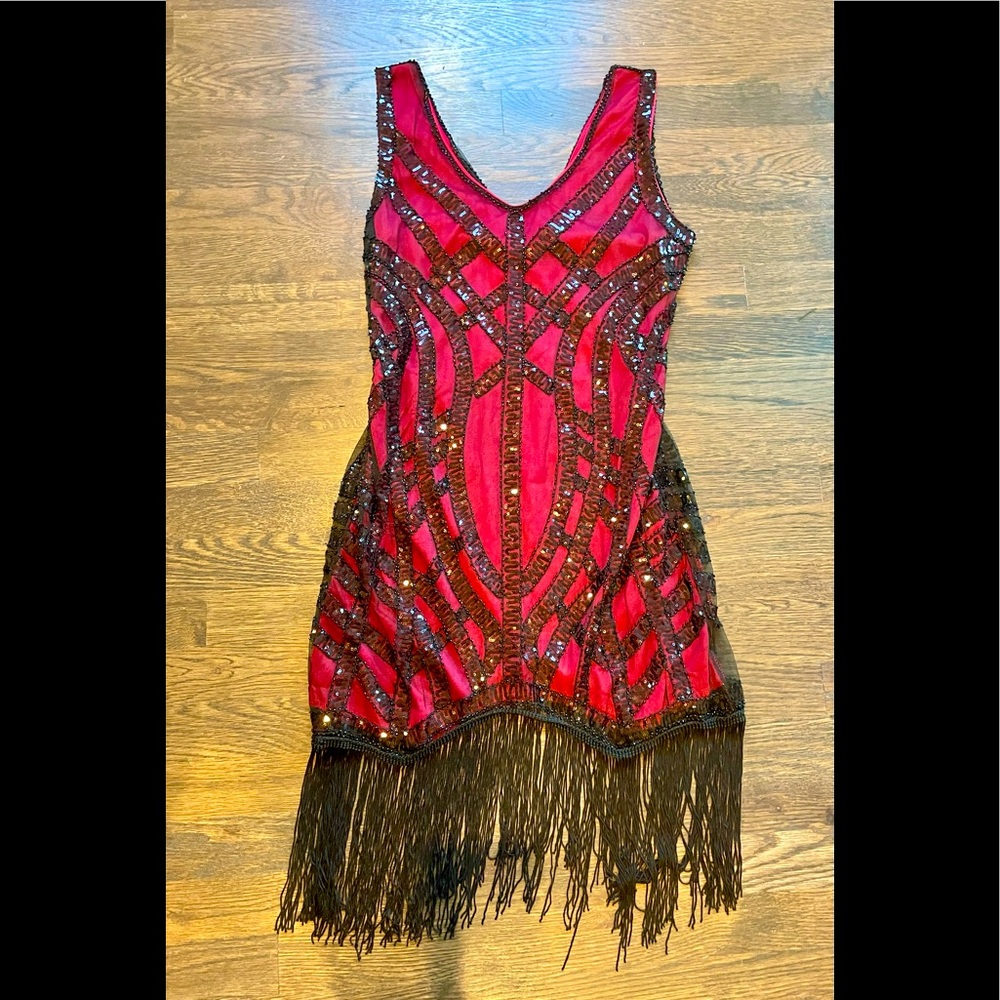 Flapper dress and feather headband.  Selling as a lot.
